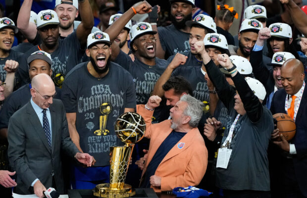 The New York Knicks win the NBA Championship for the first time in 53 years